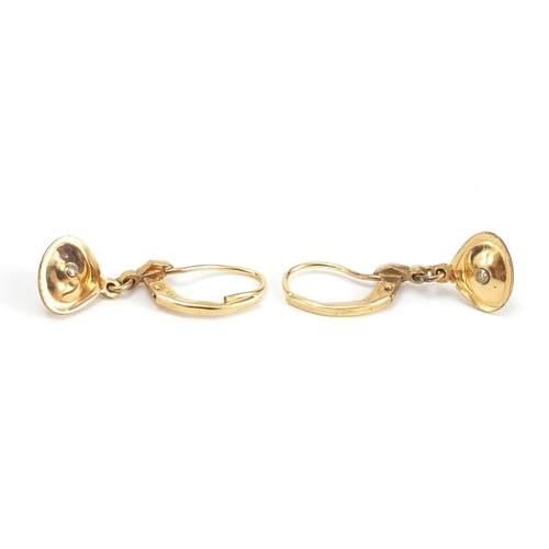 1104 - Pair of 14ct gold pearl clam design earring, 2.8cm in length, 1.6g