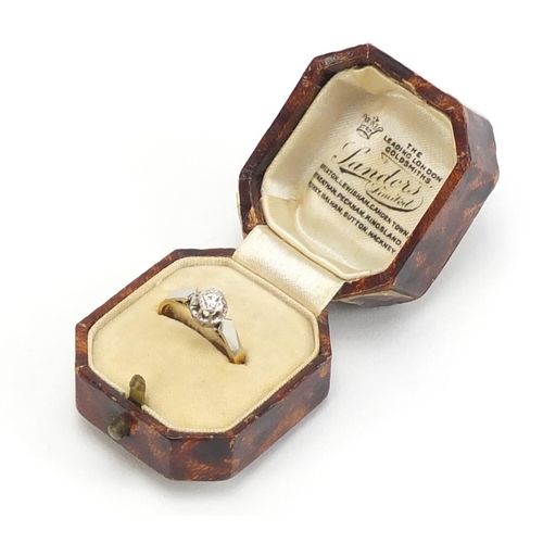 407 - 18ct gold diamond solitaire ring housed in a Sanders tooled leather box, size N, 3.6g,