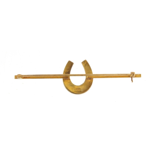 27 - 9ct gold horseshoe bar brooch, 7.5cm in length, 7.2g