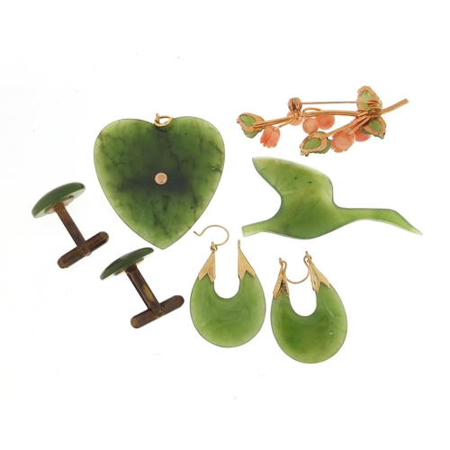 1396 - Spinach green jade jewellery including floral brooch, pair of earrings and a pair of cufflinks, the ... 