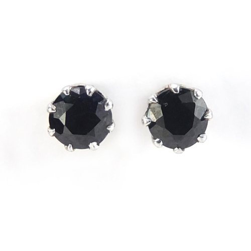358 - Pair of unmarked white metal sapphire earrings, 1.4g