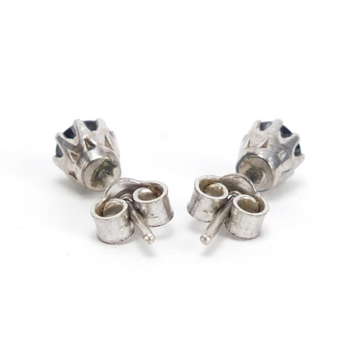 358 - Pair of unmarked white metal sapphire earrings, 1.4g