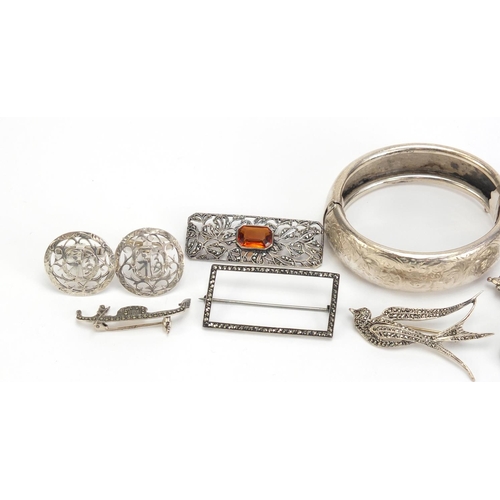 1190 - Silver jewellery including a Victorian style bangle, marcasite bird brooch and and a teddy bear broo... 