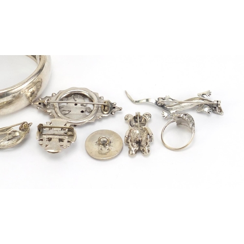 1190 - Silver jewellery including a Victorian style bangle, marcasite bird brooch and and a teddy bear broo... 