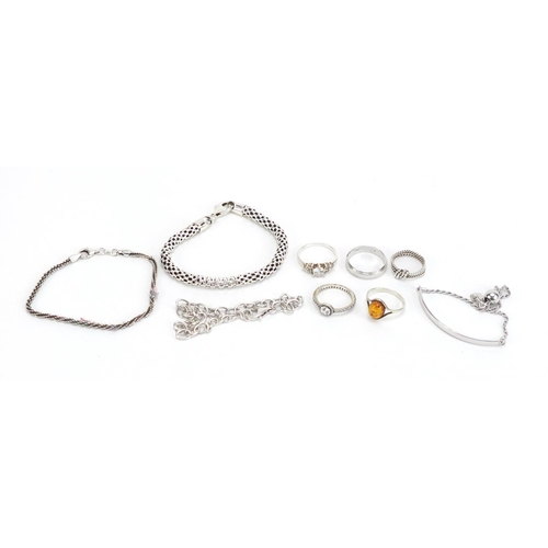 1149 - Silver jewellery including four bracelets and five rings, 34.7g