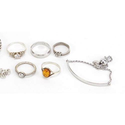 1149 - Silver jewellery including four bracelets and five rings, 34.7g