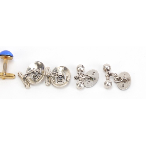 1400 - Four pairs of cufflinks including silver and enamel and amber