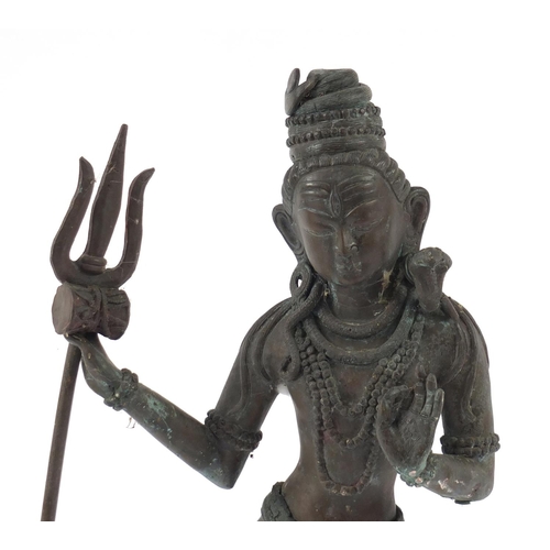 42 - Large Asian patinated bronze standing deity, possibly Burmese, 54cm high