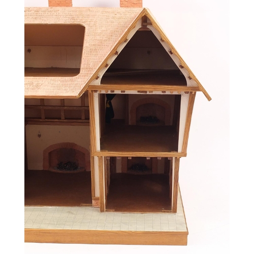 723 - Large Tudor design doll's house, 79cm H x 92cm W x 53.5cm D