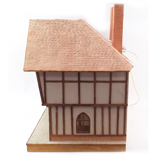 723 - Large Tudor design doll's house, 79cm H x 92cm W x 53.5cm D