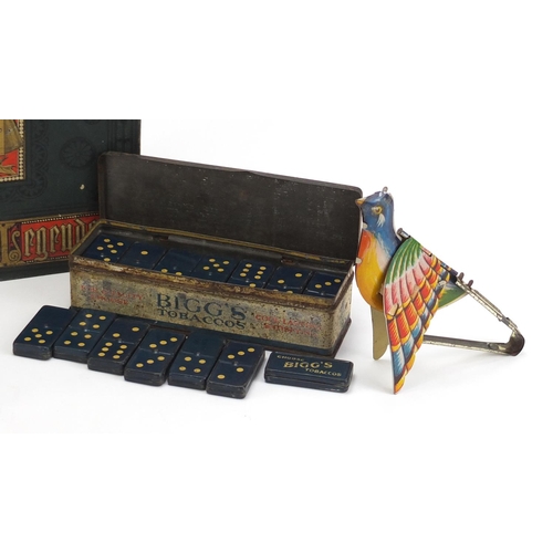 1097 - Tin plate bird, Bigg's tobacco tin dominoes and a Royal Illuminated book of Legends