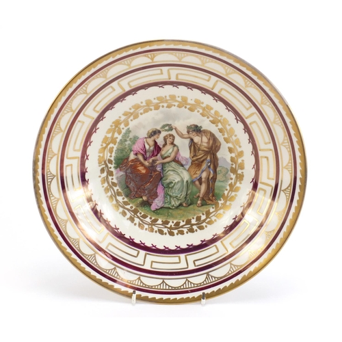 784 - Royal Copenhagen bowl decorated with three classical figures within gilt borders, 30cm in diameter