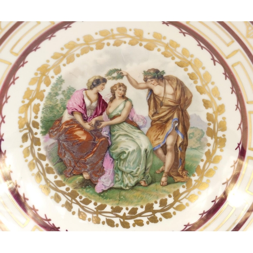 784 - Royal Copenhagen bowl decorated with three classical figures within gilt borders, 30cm in diameter