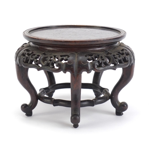 839 - Chinese hardwood stand carved with foliage, 13.5cm high x 19cm in diameter