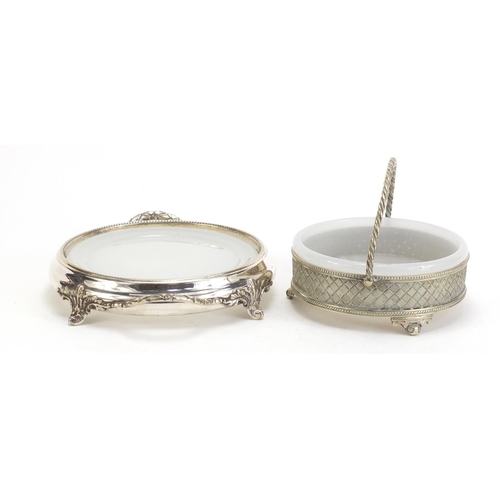 1129 - Two silver plated butter dishes with glass liners, the largest 19.5cm high