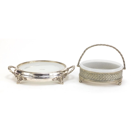 1129 - Two silver plated butter dishes with glass liners, the largest 19.5cm high