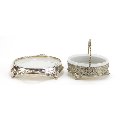 1129 - Two silver plated butter dishes with glass liners, the largest 19.5cm high