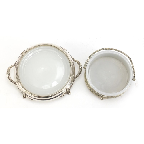 1129 - Two silver plated butter dishes with glass liners, the largest 19.5cm high