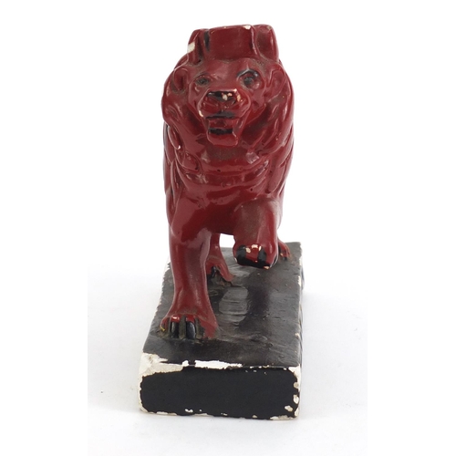 1154 - Vintage Booth's gin hand painted plaster lion, 17cm wide