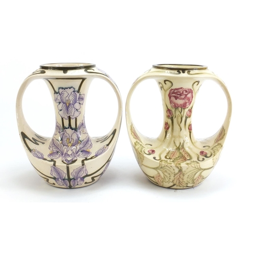 787 - Two Art Nouveau style Cobridge vases with twin handles hand painted with flowers, one limited editio... 