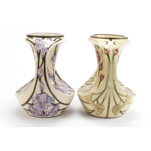 787 - Two Art Nouveau style Cobridge vases with twin handles hand painted with flowers, one limited editio... 