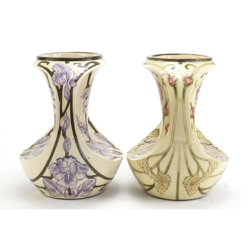 787 - Two Art Nouveau style Cobridge vases with twin handles hand painted with flowers, one limited editio... 