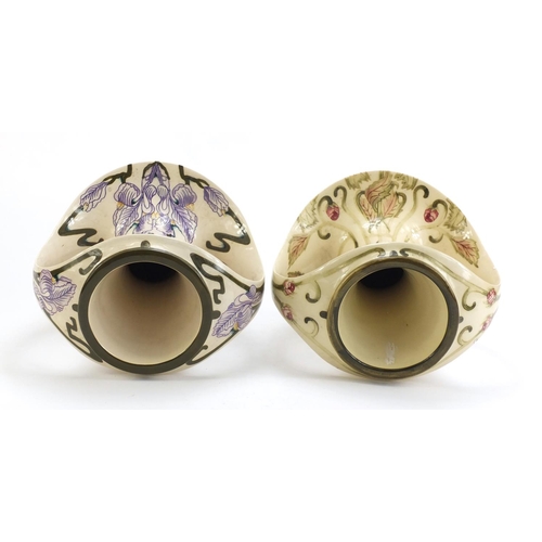 787 - Two Art Nouveau style Cobridge vases with twin handles hand painted with flowers, one limited editio... 