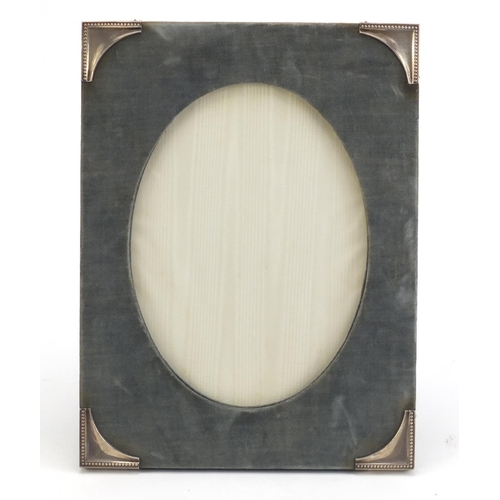 816 - Rectangular velvet easel photo frame with silver mounts, T.P London 1983, 30.5cm x 23cm