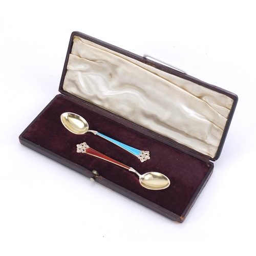 818 - Pair of Norwegian 925S silver and enamel teaspoons, housed in a fitted case, each 9.5cm in length, 1... 