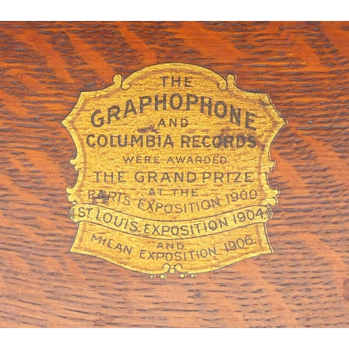 689 - The Columbia oak cased Graphophone with aluminium horn, winners of the Gold medal prize 1900, 1905 a... 