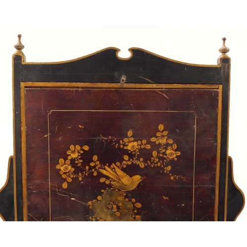 642 - Chinese black lacquered fire screen gilded with a figure in a palace setting, 87.5cm high x 80cm wid... 