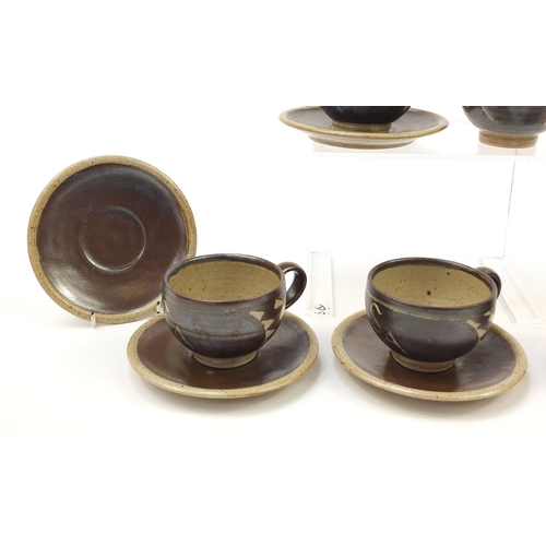 160 - Chris Lewis set of six South Heighton studio pottery cups with sauces, each hand painted with an abs... 