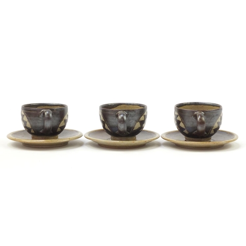 160 - Chris Lewis set of six South Heighton studio pottery cups with sauces, each hand painted with an abs... 