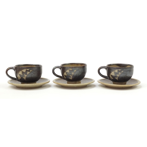 22 - Chris Lewis set of six South Heighton studio pottery cups with sauces, each hand painted with an abs... 