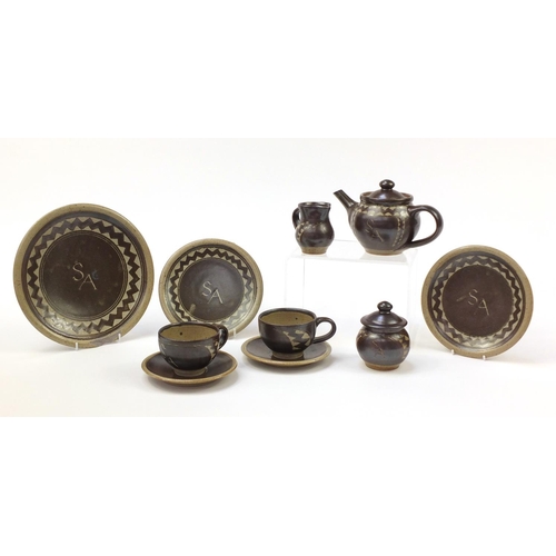 854 - Chris Lewis South Heighton studio pottery tea for two including a teapot, each hand painted with an ... 