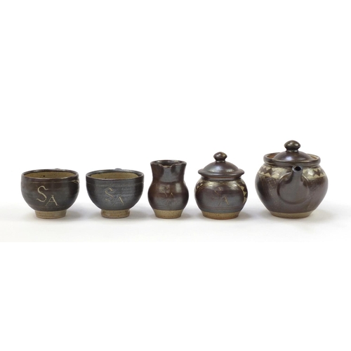 189 - Chris Lewis South Heighton studio pottery tea for two including a teapot, each hand painted with an ... 