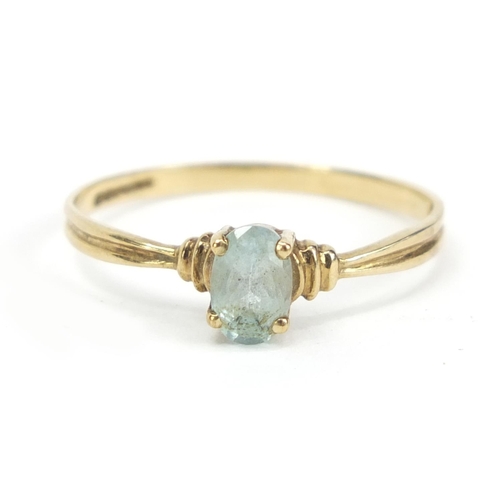 536 - 9ct gold blue stone solitaire ring, size O, 1.0g