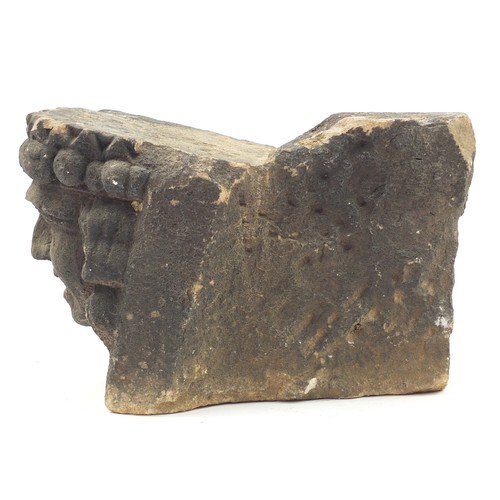 99 - Antique carved stone support with figural decoration, 30cm high x 50cm in length