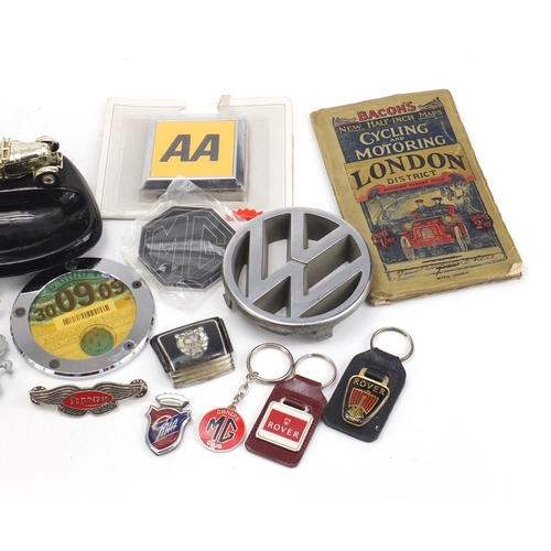 1073 - Automobilia including car badges and an ashtray