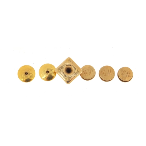 1344 - Six 9ct gold gentlemen's dress studs, three housed in a James Walker tooled leather box, 5.6g