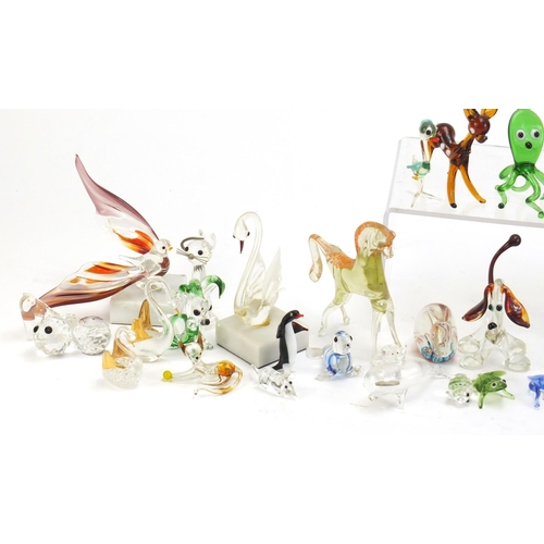 1074 - Collection of colourful glass animals including a bird and swan with square marble bases, the larges... 