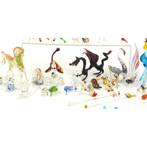 1074 - Collection of colourful glass animals including a bird and swan with square marble bases, the larges... 