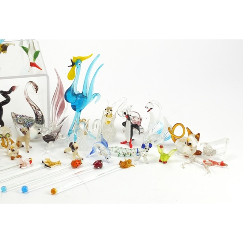 1074 - Collection of colourful glass animals including a bird and swan with square marble bases, the larges... 