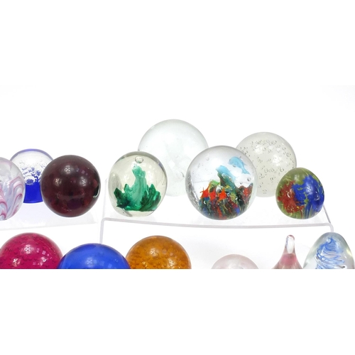 1556 - Collection of colourful glass paperweights, the largest 13.5cm high