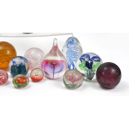 1556 - Collection of colourful glass paperweights, the largest 13.5cm high