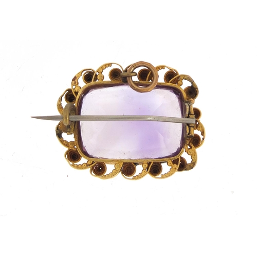 404 - Victorian amethyst brooch with unmarked gold mount (tests as 9ct gold), 3cm wide, 9.1g