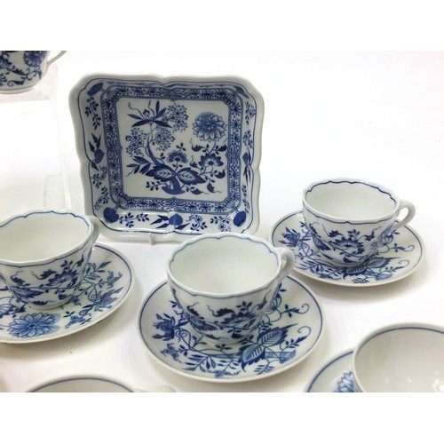 212 - Hutschenreuther tea and dinner ware to include jugs, cups, saucers, soup bowls decorated in the Blue... 