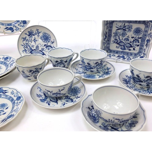 212 - Hutschenreuther tea and dinner ware to include jugs, cups, saucers, soup bowls decorated in the Blue... 