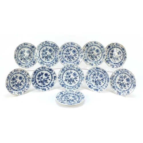 856 - Eleven Meissen tea plates, each hand painted in the Blue Onion pattern, crossed sword marks to the b... 