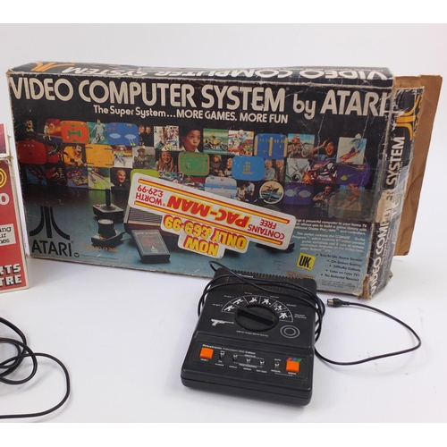 1383 - Vintage and later video games including Atari CX-2600, Video Sports Centre and Game Cube